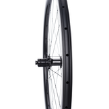 Rim profile of the Hyperdrive carbon disc brake wheel by Velocite, highlighting aerodynamic design and precision engineering.