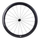 Velocite carbon rim brake rear wheel in a frontal view showcasing lightweight design