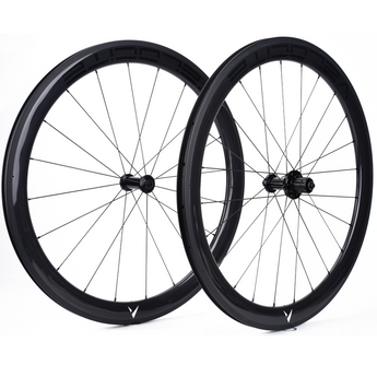 Velocite carbon rim brake wheelset paired, designed for road cycling speed and efficiency