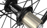 Close-up view of a Velocite freehub mounted on a rear road bike wheel.